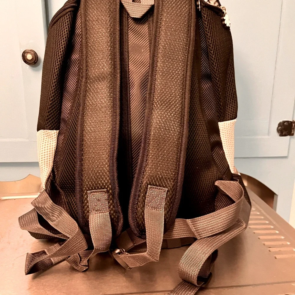 Portable new doggie backpack. Medium dog size. Oxford style. Pockets.Harness